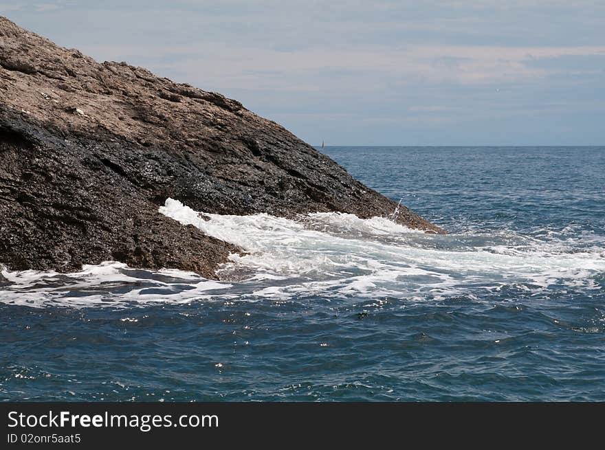 Black Sea. Sea surf. Kind of a wave crashed against the rocks.