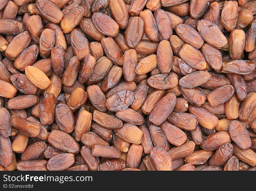 Background of brown dried dates. Background of brown dried dates