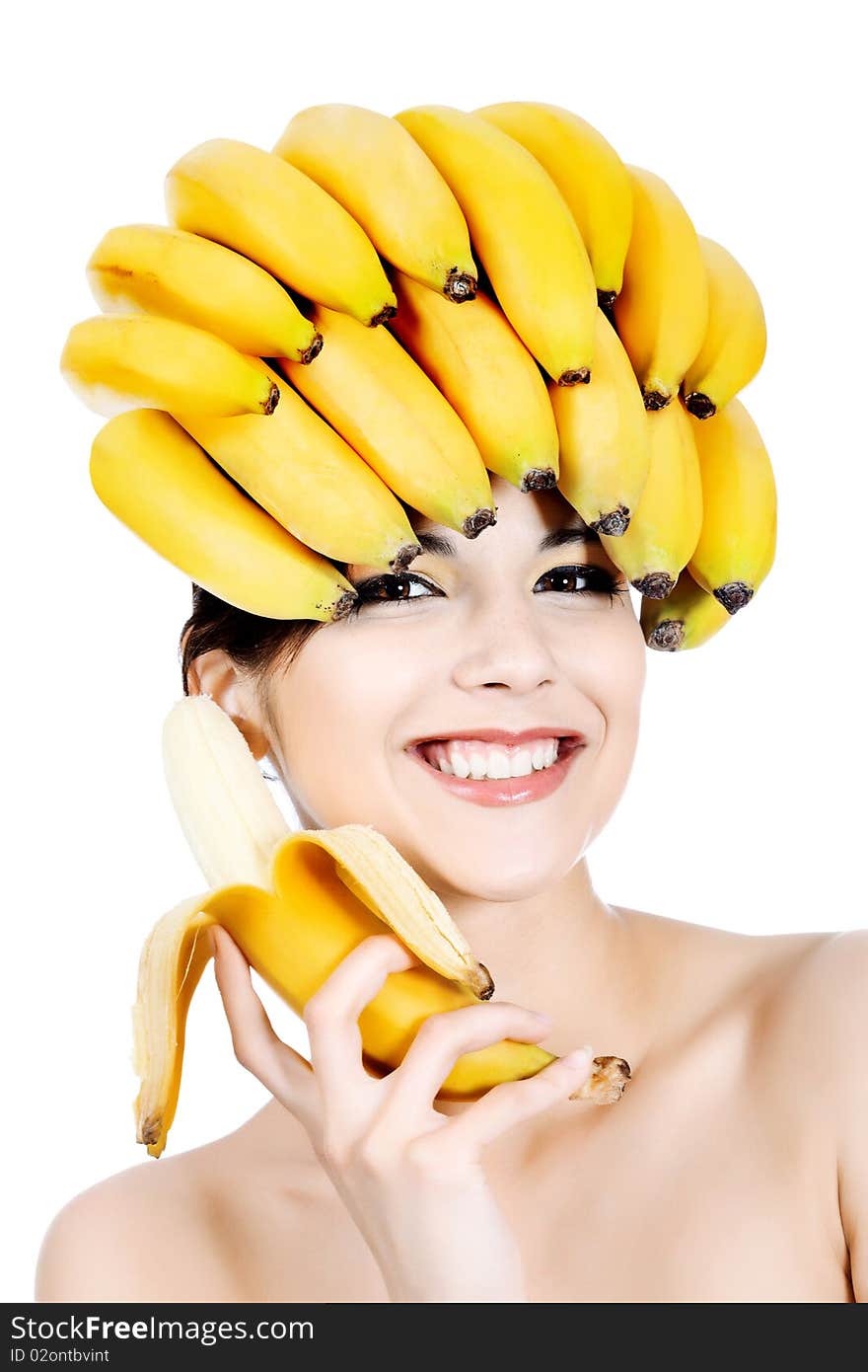 Shot of a beautiful young woman with fruits headwear. Food concept, healthcare. Shot of a beautiful young woman with fruits headwear. Food concept, healthcare.