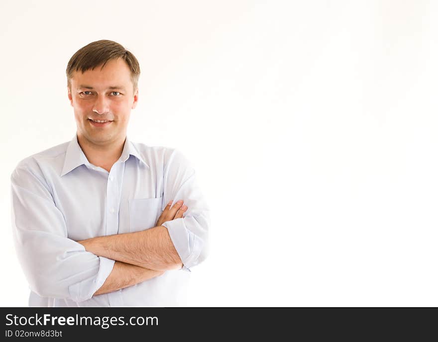 Portrait of a happy businessman on a white background