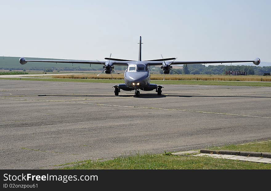 Midsize airliner scrolls to the ramp - view from the front. Midsize airliner scrolls to the ramp - view from the front