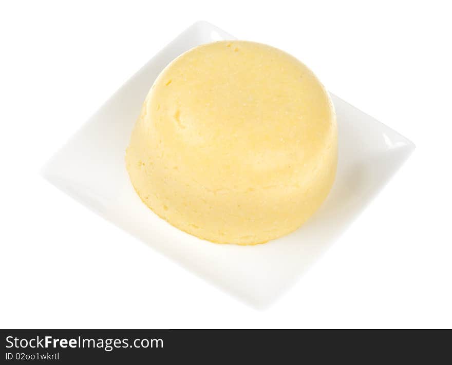 Mamaliga ( polenta ) on a white background