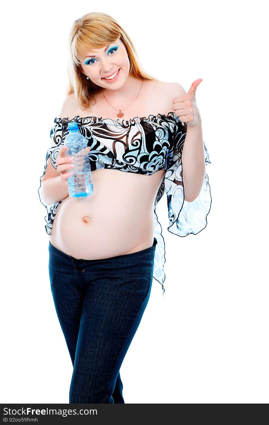 Portrait of a pregnant woman holding a bottle with water. Isolated over white background. Portrait of a pregnant woman holding a bottle with water. Isolated over white background.