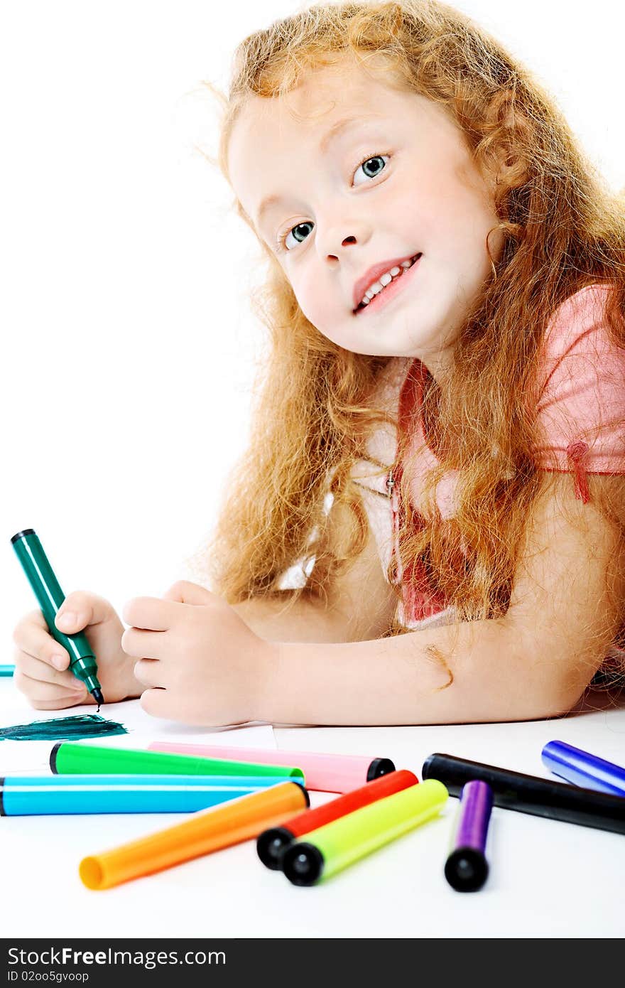 Portrait of a happy girl with felt pens. Isolated over white background. Portrait of a happy girl with felt pens. Isolated over white background.