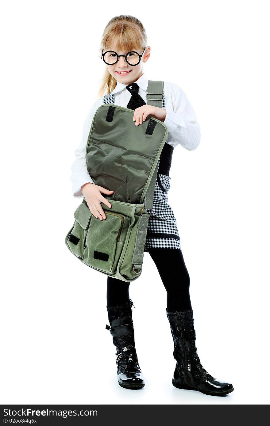 Shot of a little girl in glasses with her school bag. Isolated over white background. Shot of a little girl in glasses with her school bag. Isolated over white background.