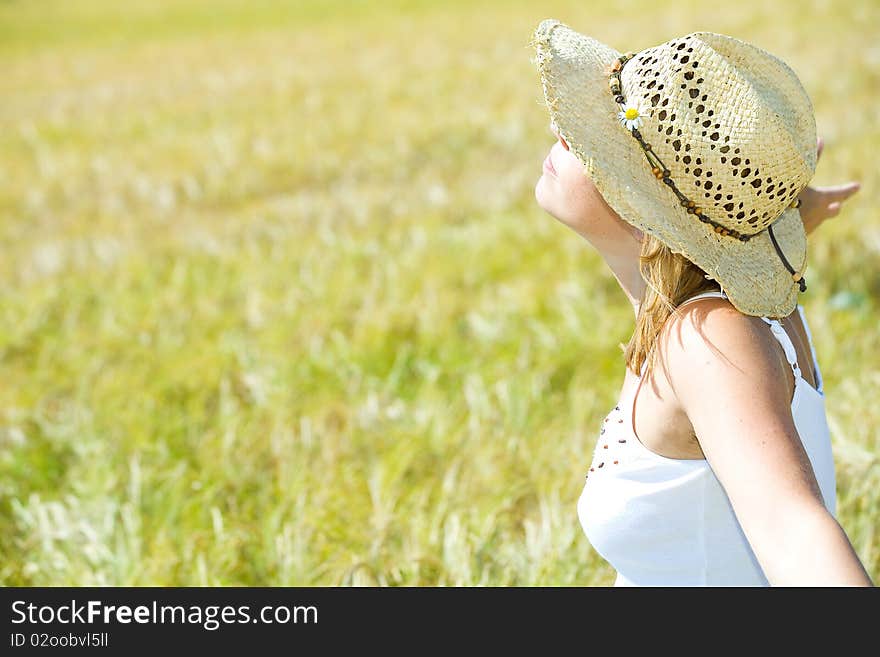 Young woman in cornfield feels good. Young woman in cornfield feels good