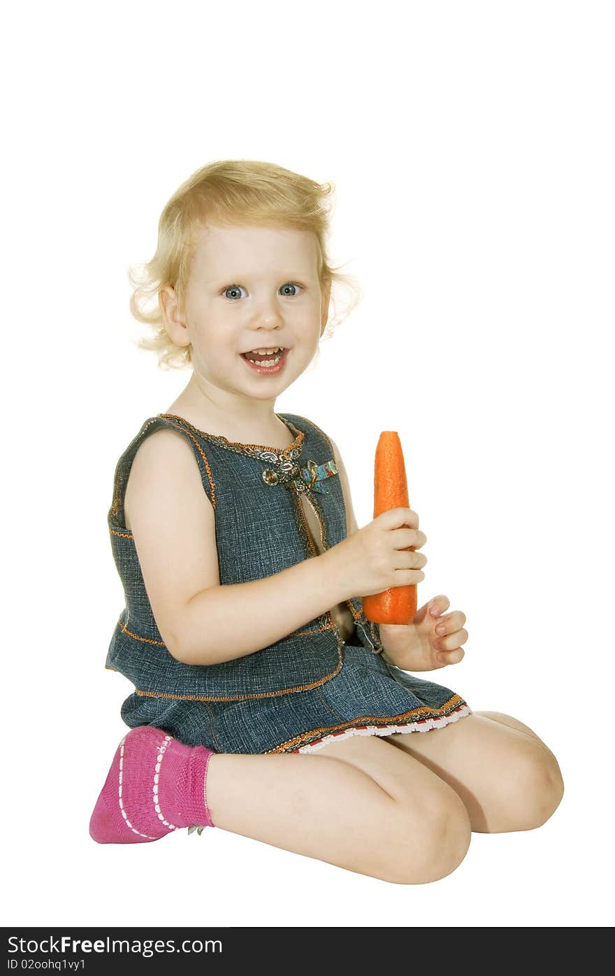 Small girl with carrot