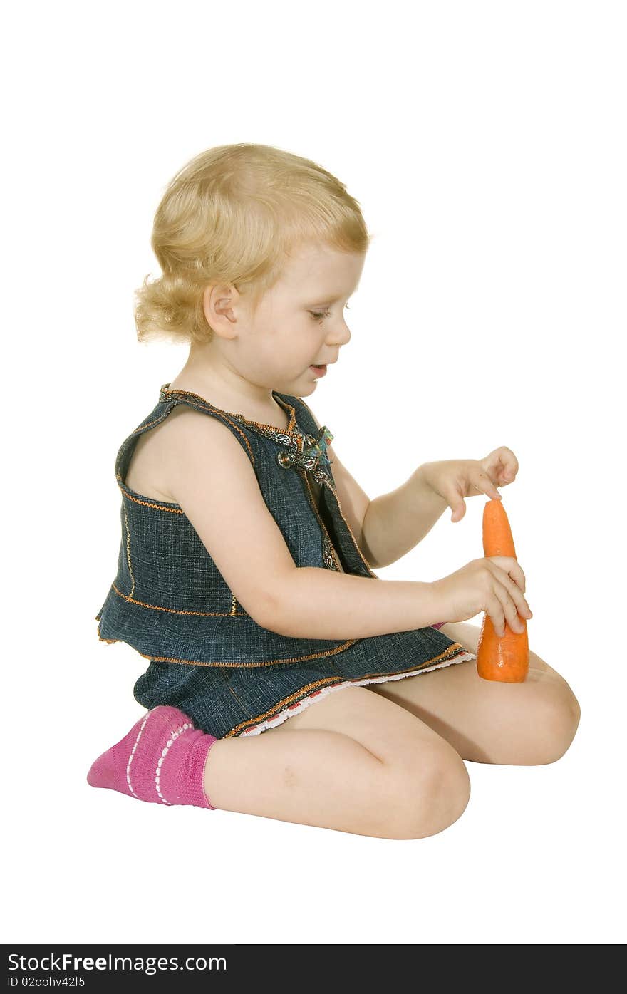 Small girl with carrot