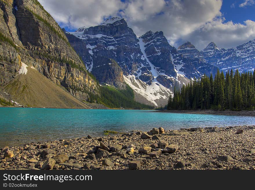 HDR Rocky mountain peaks and moraine lake, Banff National Park, Alberta, Canada. HDR Rocky mountain peaks and moraine lake, Banff National Park, Alberta, Canada