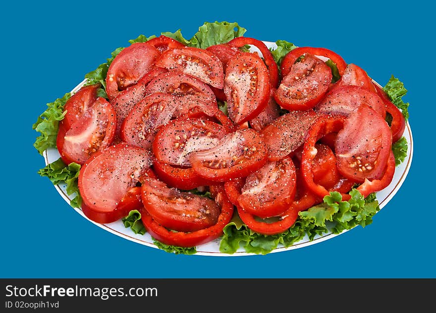 Salad from a tomato on the big plate. Salad from a tomato on the big plate