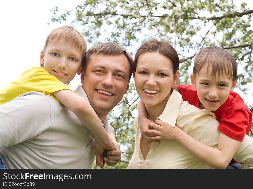 Portrait of a happy family on a light