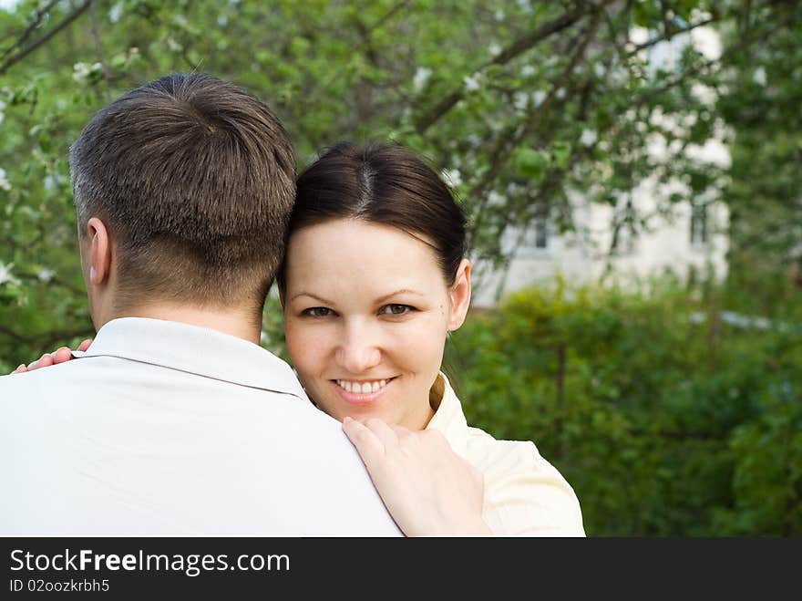 Young couple in the summer park