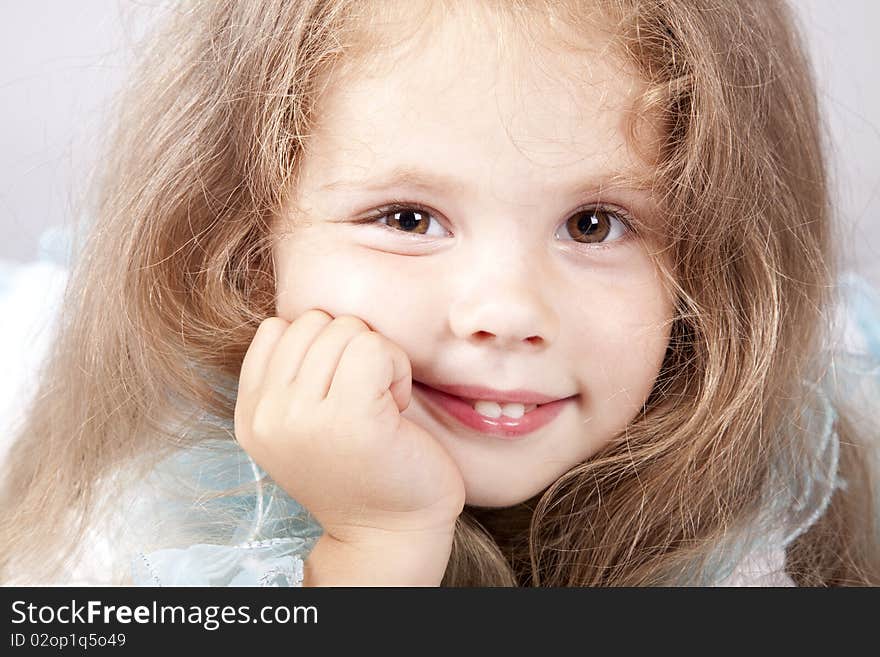 Portrait of beautiful little girl. Studio shot.