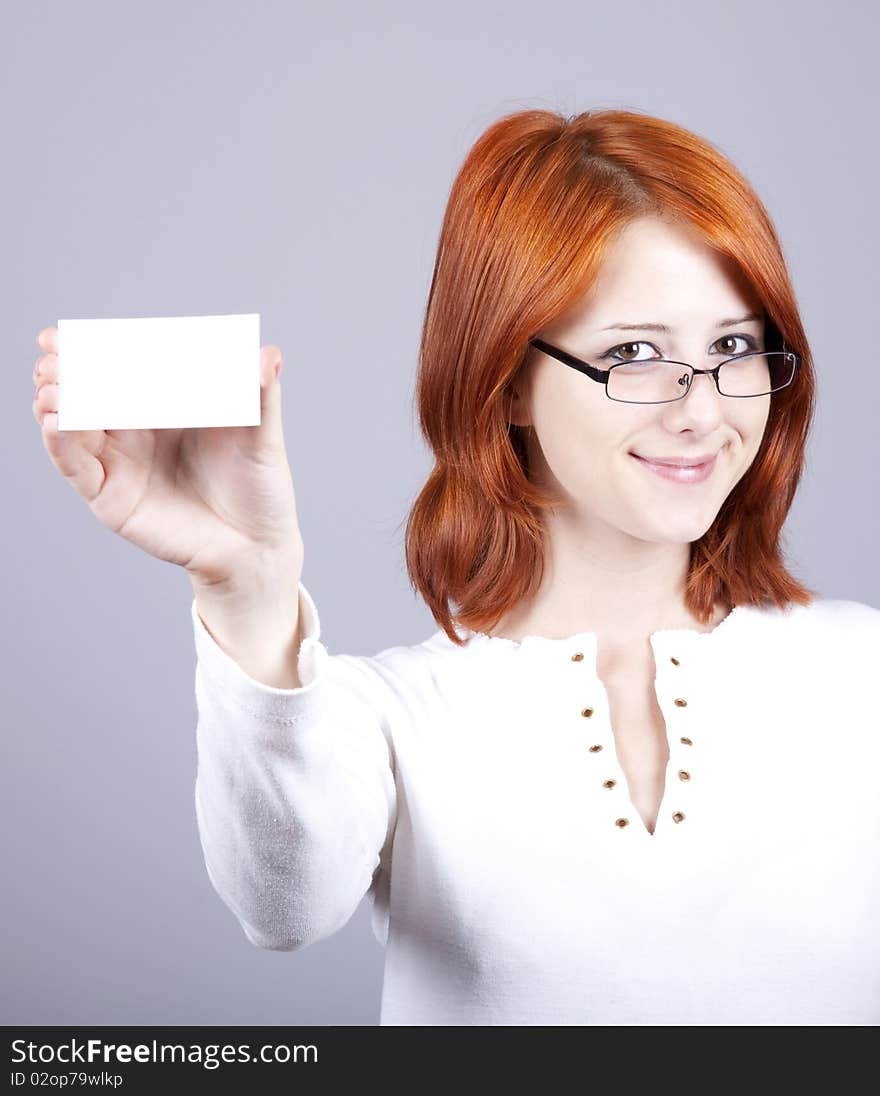 Portrait of an young beautiful happy woman with blank white card. Portrait of an young beautiful happy woman with blank white card