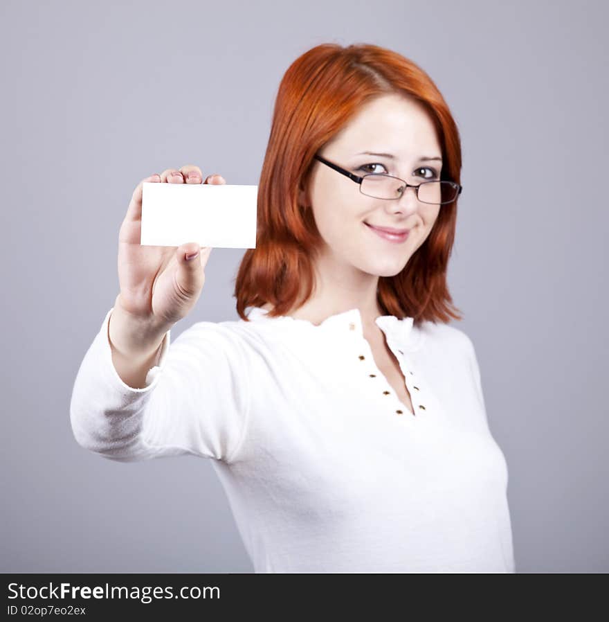 Portrait of an young beautiful happy woman with blank white card. Portrait of an young beautiful happy woman with blank white card