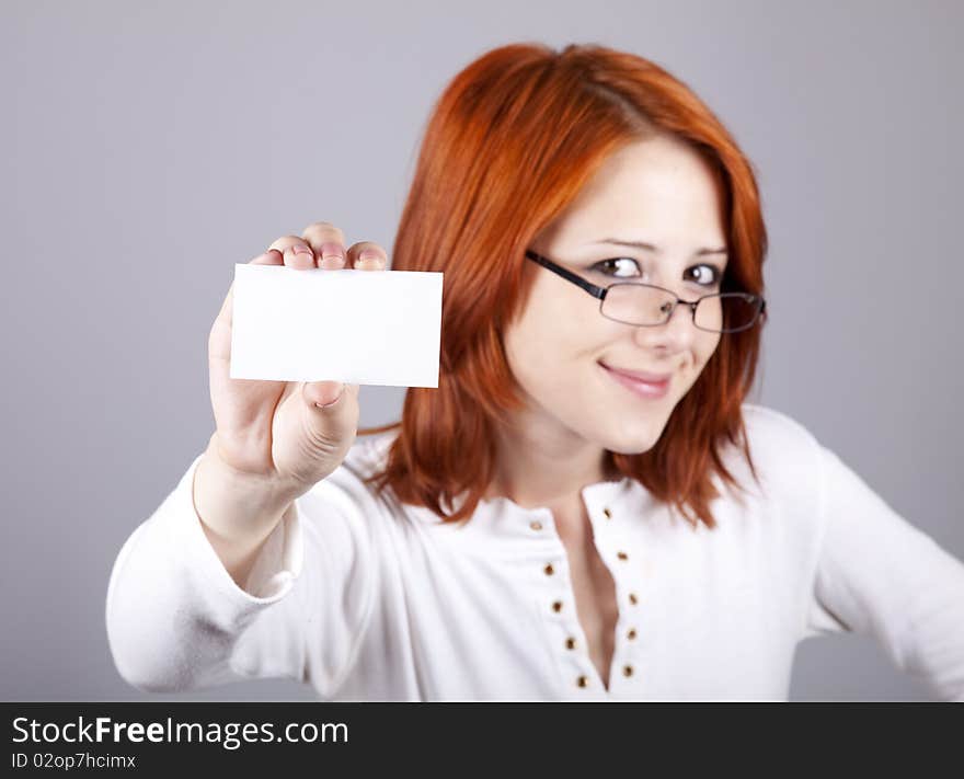 Portrait of an young beautiful happy woman with blank white card. Portrait of an young beautiful happy woman with blank white card