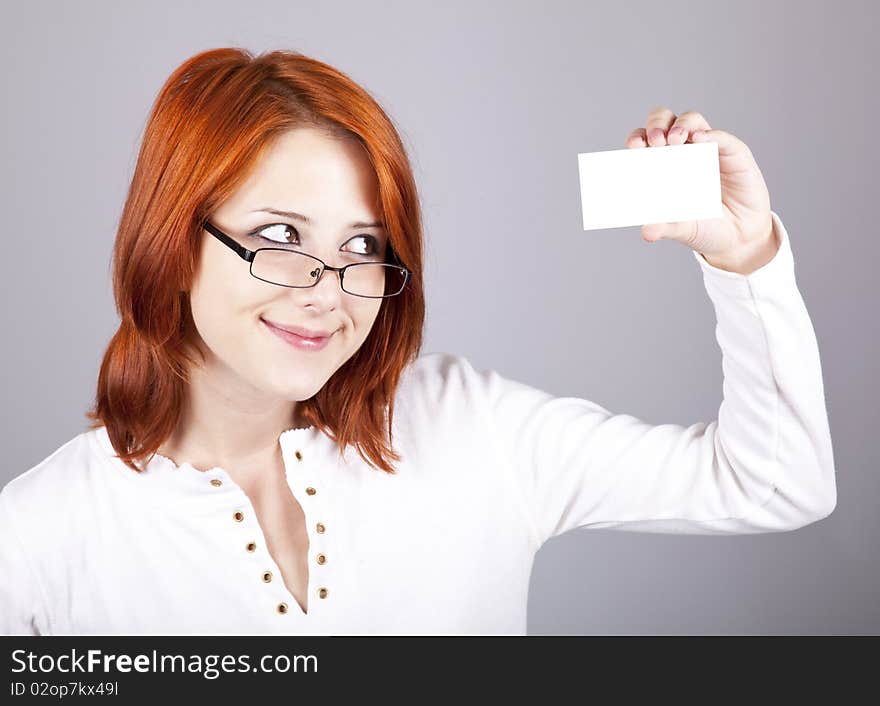 Portrait of an young beautiful happy woman with blank white card. Portrait of an young beautiful happy woman with blank white card