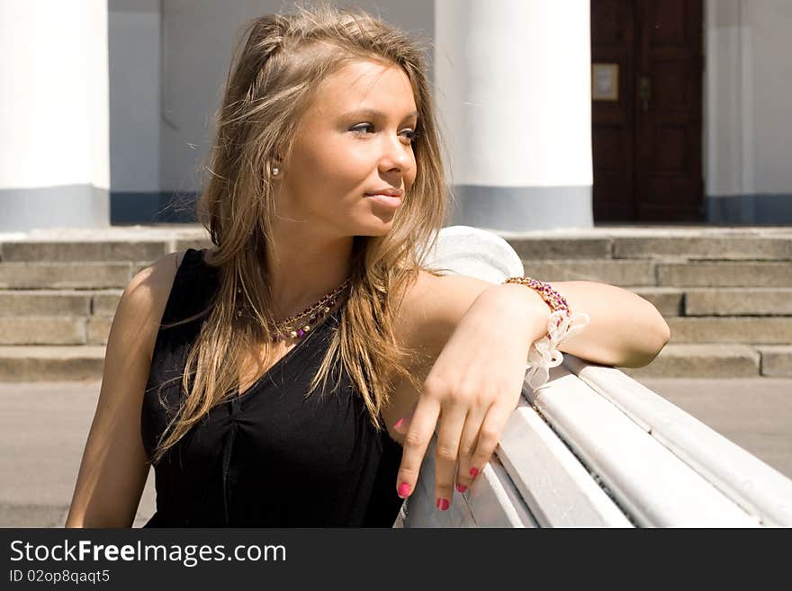 Girl Sitting On Bench