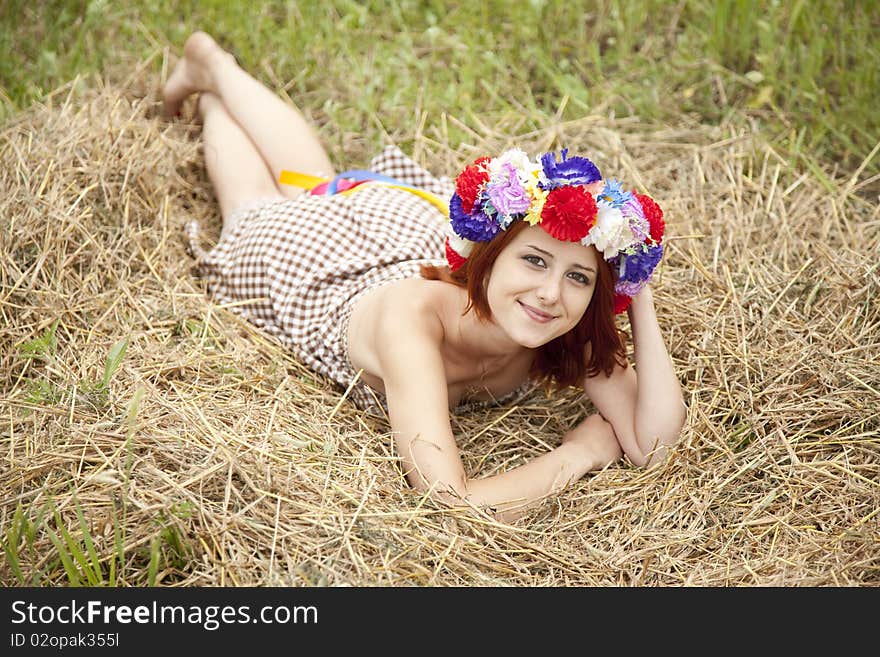 Girl In Slav National Wreath Lying At Field.