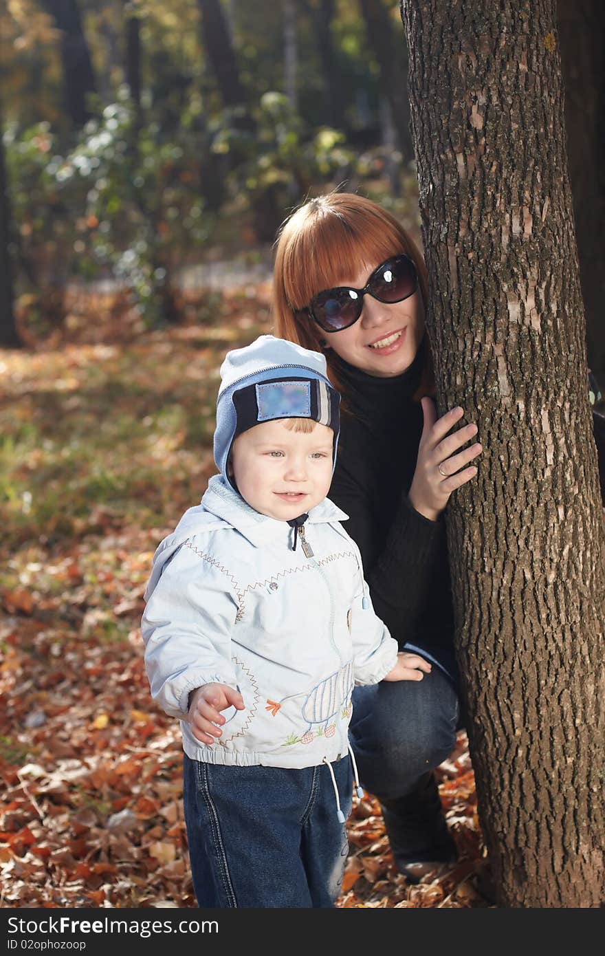 Baby boy with mother play in park. Baby boy with mother play in park