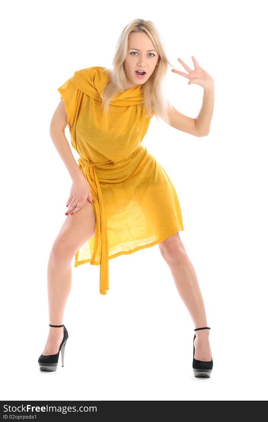 Beautiful young woman in yellow dress isolated in white