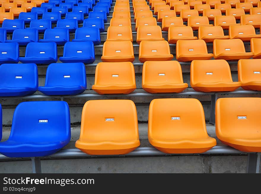 Blue and orange seat in football sadium