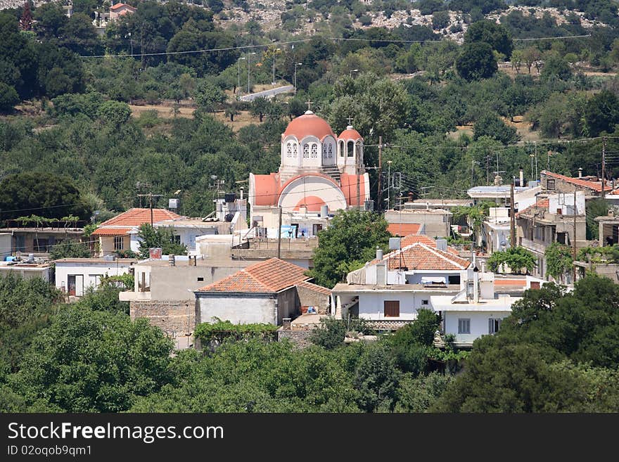 Small Cretan Village With Church