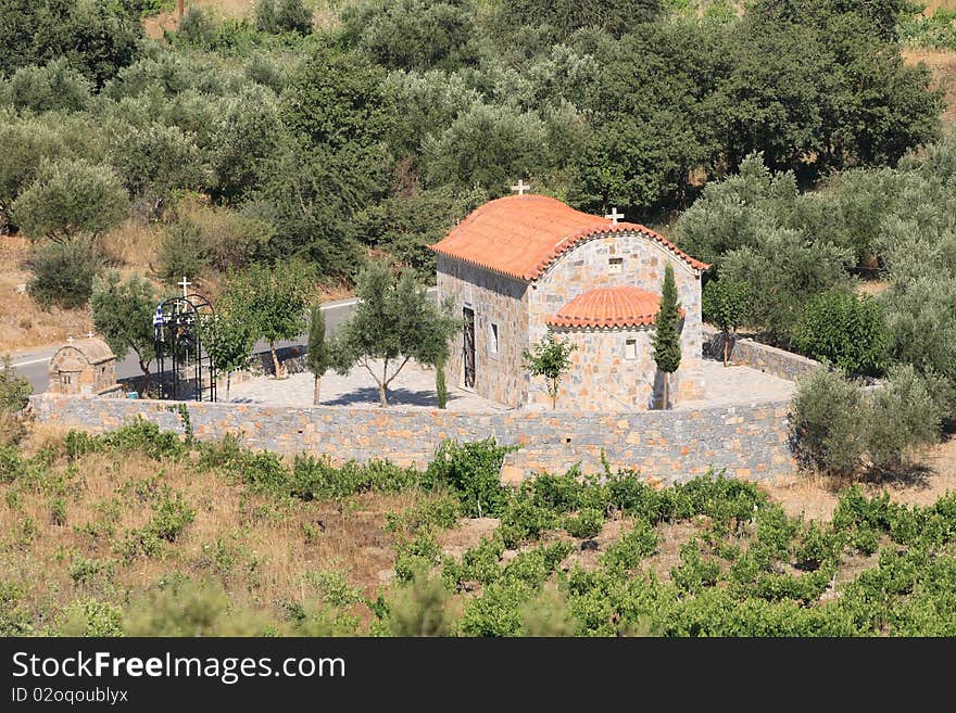 Small greek church on sunny day on summer