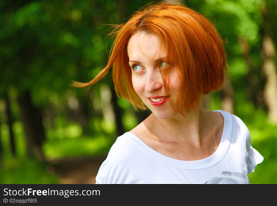 Portrait of young smiling woman with red hairs. Portrait of young smiling woman with red hairs