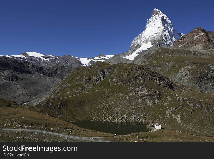 The symbol of the Alps - the Matterhorn, one of the lakes below. The symbol of the Alps - the Matterhorn, one of the lakes below.