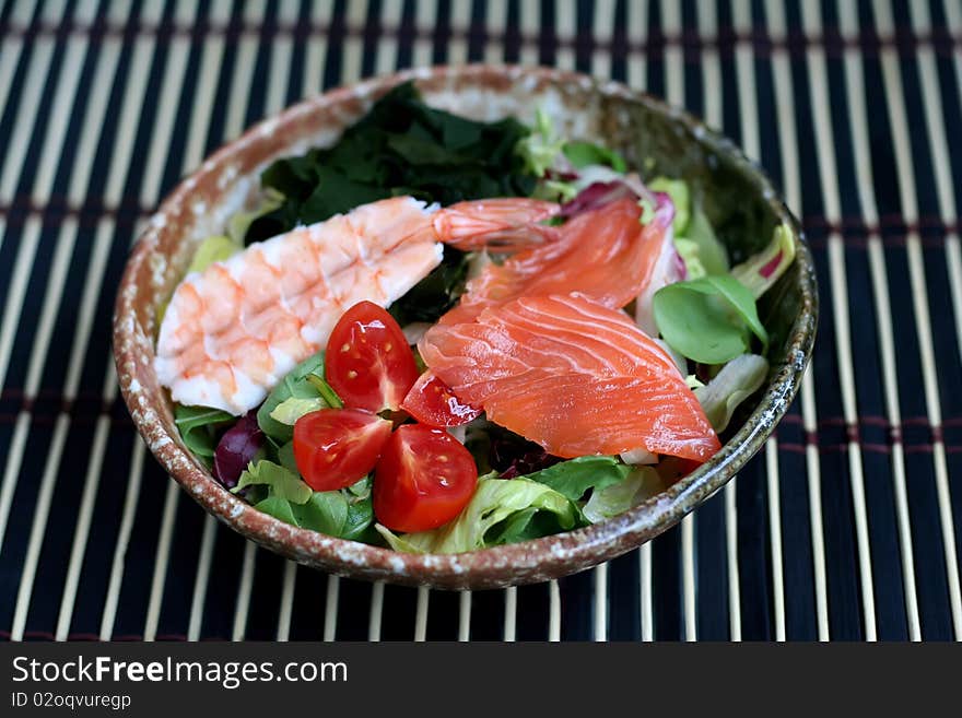 Salad with seafood, salmon and Shrimp