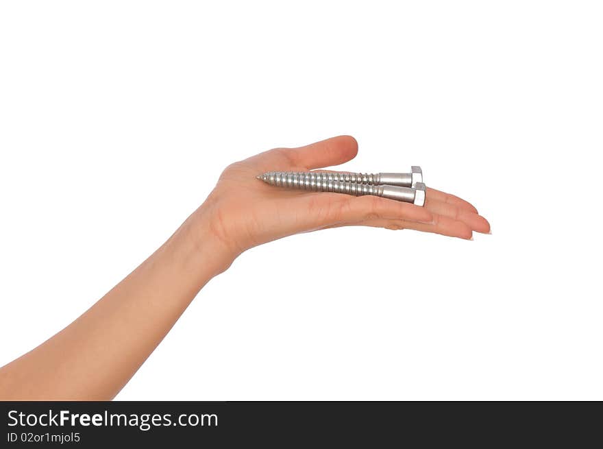 Woman holding two big bolts in the hand. Woman holding two big bolts in the hand