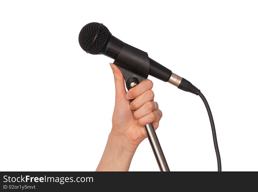 Woman holding big black microphone for singing