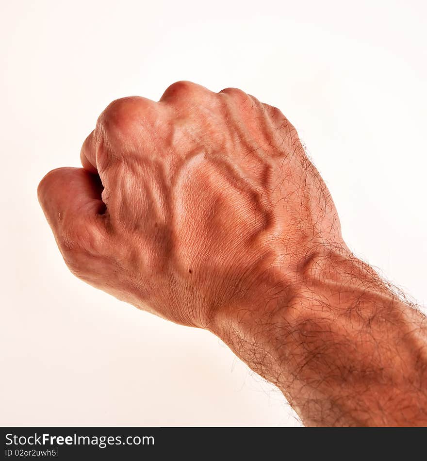 White male right hand, fist.