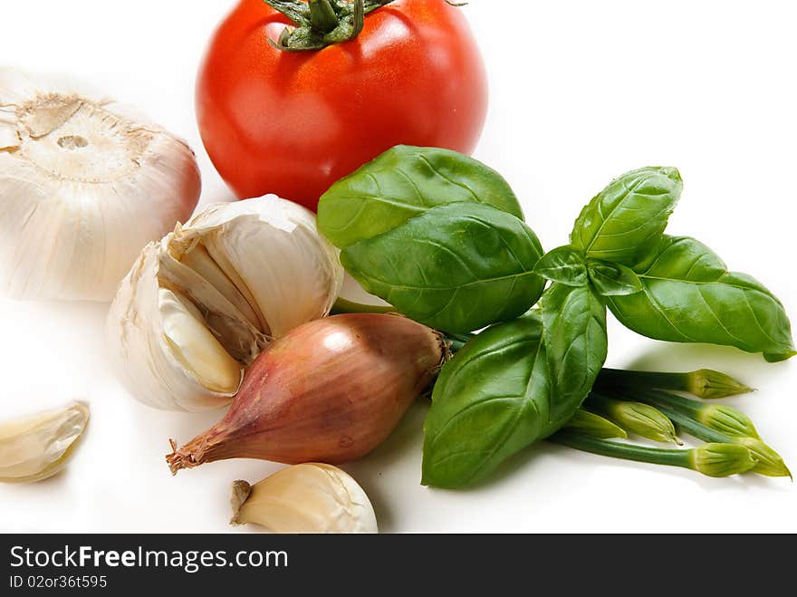 Close up of mixed vegetables of tomatoes, herbs and spices