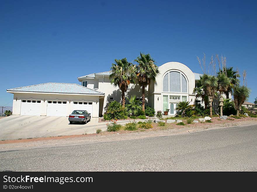 This home looks lopsided but has very nice landscape. This home looks lopsided but has very nice landscape.