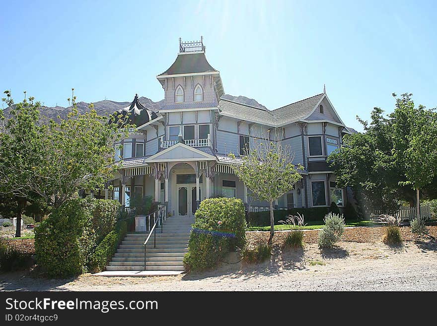 This old victorian style home is massive in size. This old victorian style home is massive in size.