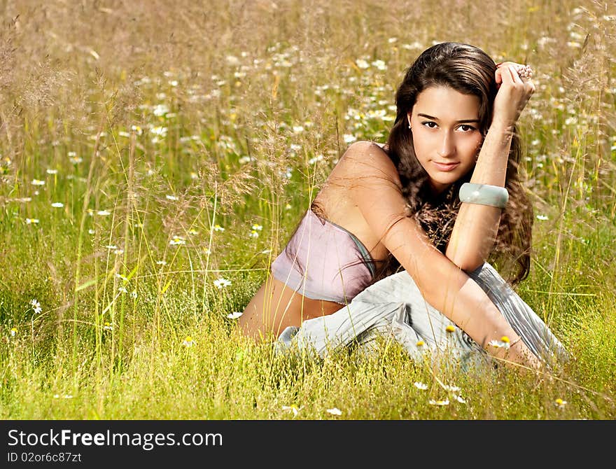 Beautiful Model On A Grass.