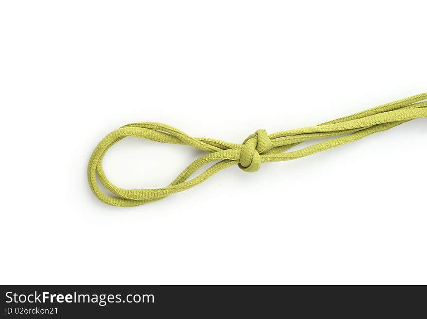 Rope with knot close up. Isolated on white background.