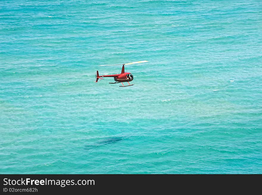 Helicopter over the ocean