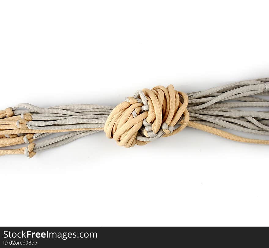 Rope with knot close up. Isolated on white background.