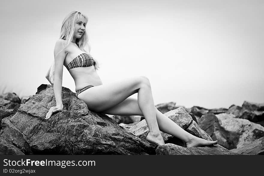 Young beautiful woman  on the beach. Young beautiful woman  on the beach