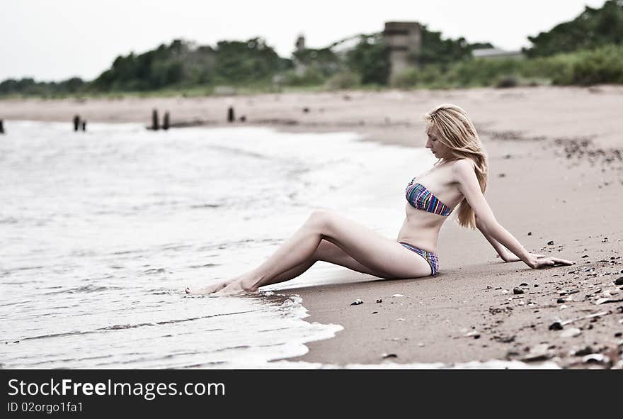 Young beautiful woman  on the beach. Young beautiful woman  on the beach