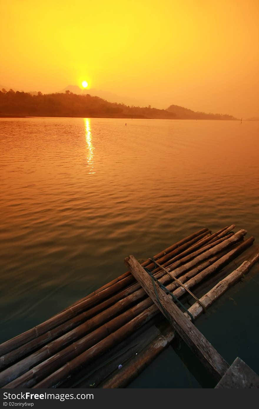 Floating on the lake and sunset