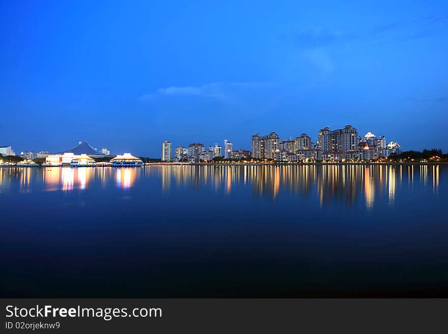 Singapore City at dusk, TangJong Rhu Indoor stadium with residence area. Singapore City at dusk, TangJong Rhu Indoor stadium with residence area.