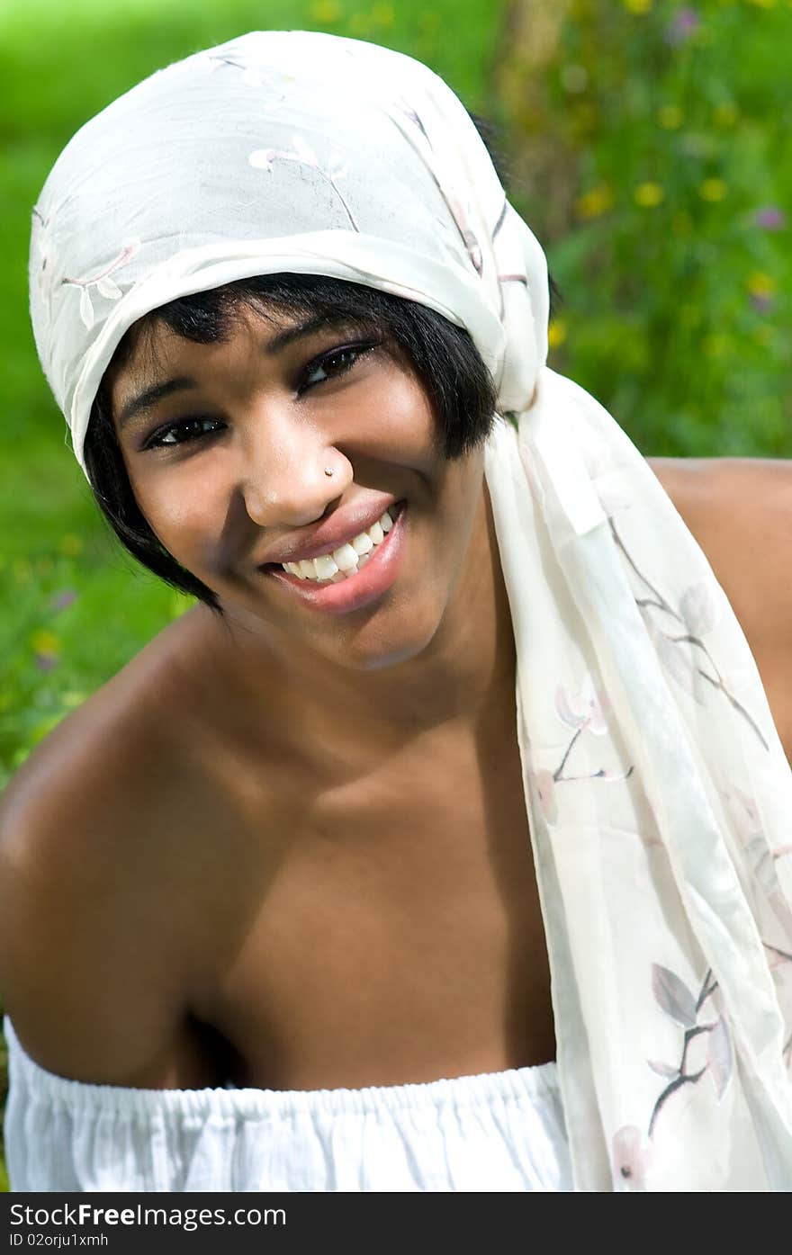 Portrait of a beautiful black woman in nature setting