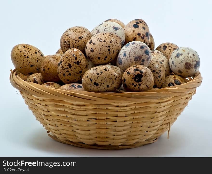 Quail eggs in the basket