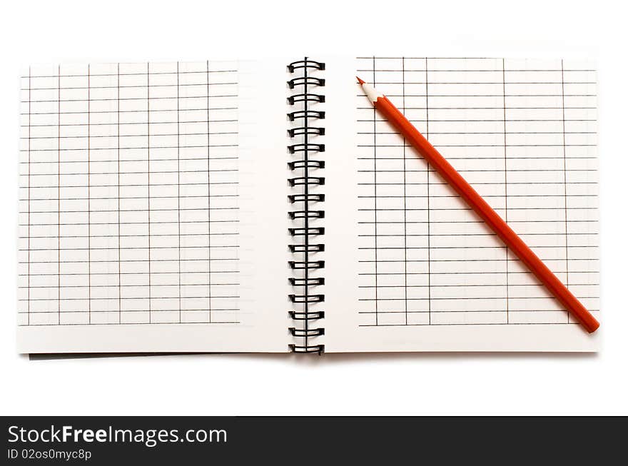 Notebook with a red pencil on a white background