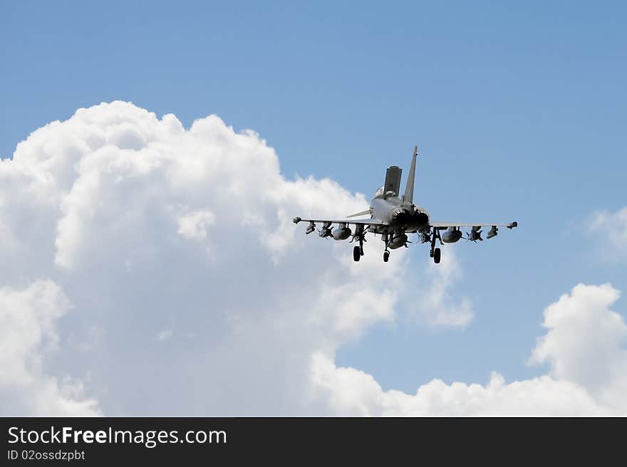 Eurofighter Typhoon applying air brakes during landing descent.