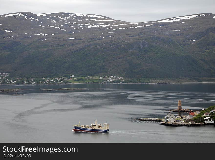 Boat on fjord at Alesund, Norway